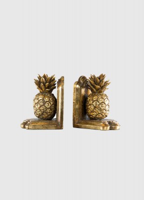 Bokstöd, ananasBokstöd i form av två guldfärgade ananaser.Höjd: 17 cmBredd: 12 cmFärg: Guld 