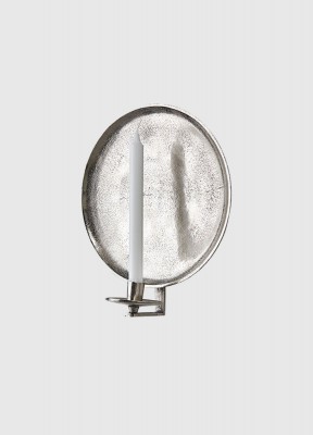 Fyll ditt hem med ljusDenna vackra ljushållare är jättefin att fylla upp en tom vägg med och tillför ett extremt mysigt ljus.Diameter: 30 cm Höjd (med arm): 34 cmFärg: NickelMaterial: Aluminium Ytbehandling: Rå, antikbehandlad