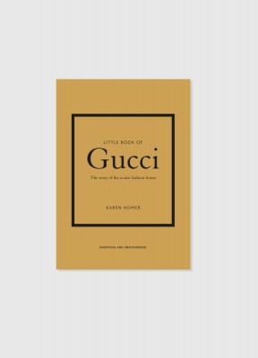 Coffee table book från Gucci, Little book of Gucci gult omslag med svart text 