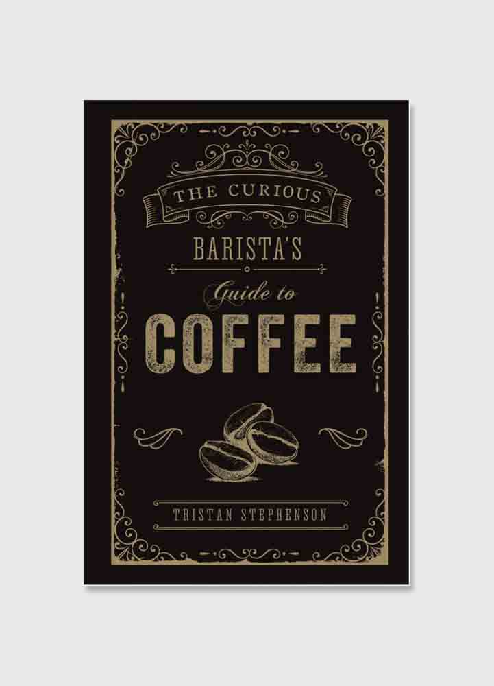 Fars dag present, svart coffe table book  med en ljus beige text som säger the courious baristas guide to coffee.
